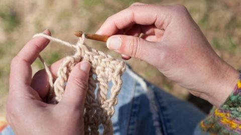 Hands crocheting