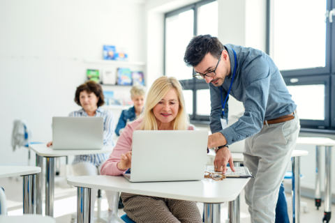 two people using a computer