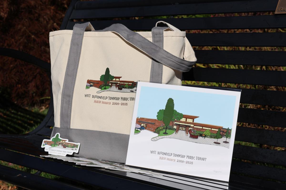 a tote bag, sticker, and print with an illustration of the library